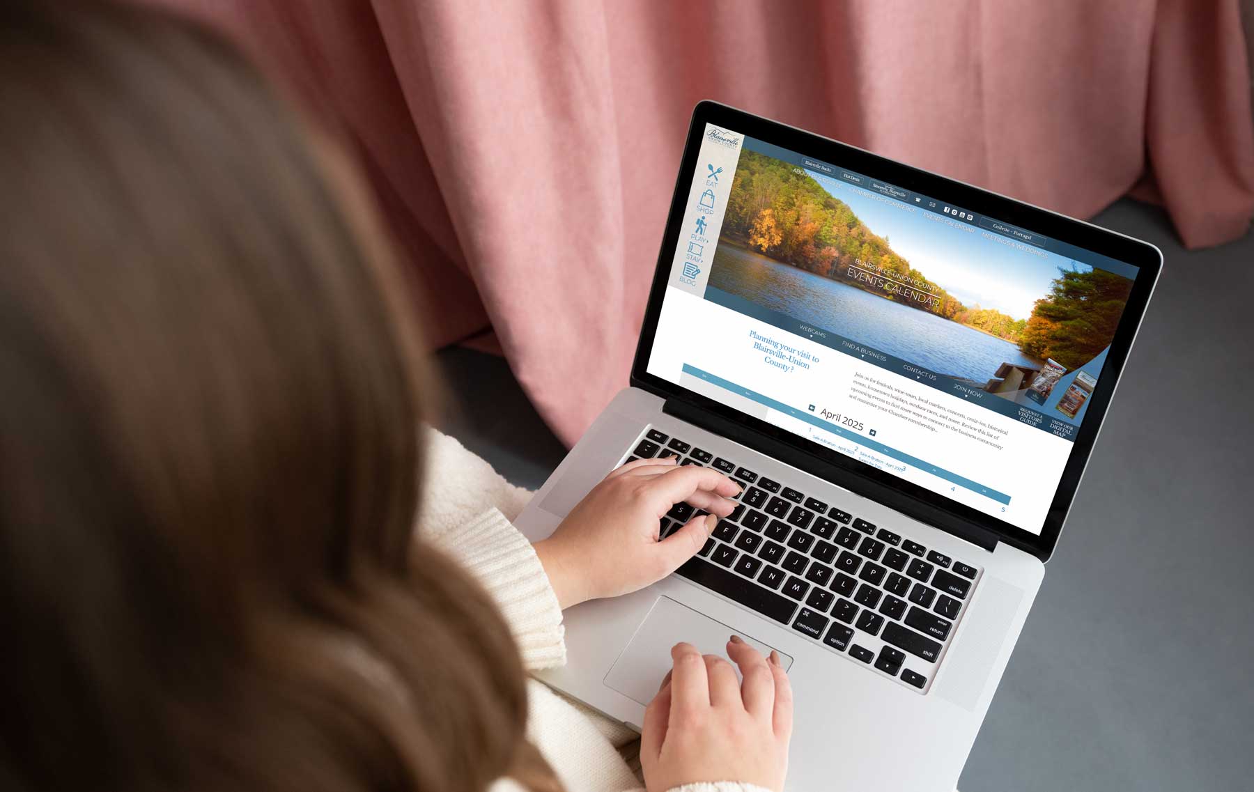 woman researching events on computer